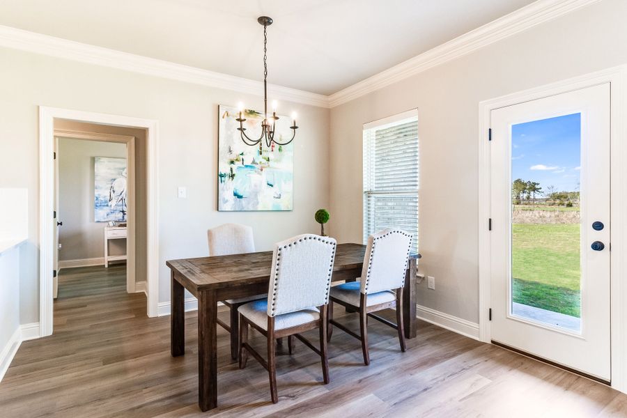 Furnished interior in a model home at Eagle Pointe in Pensacola (Image 7).