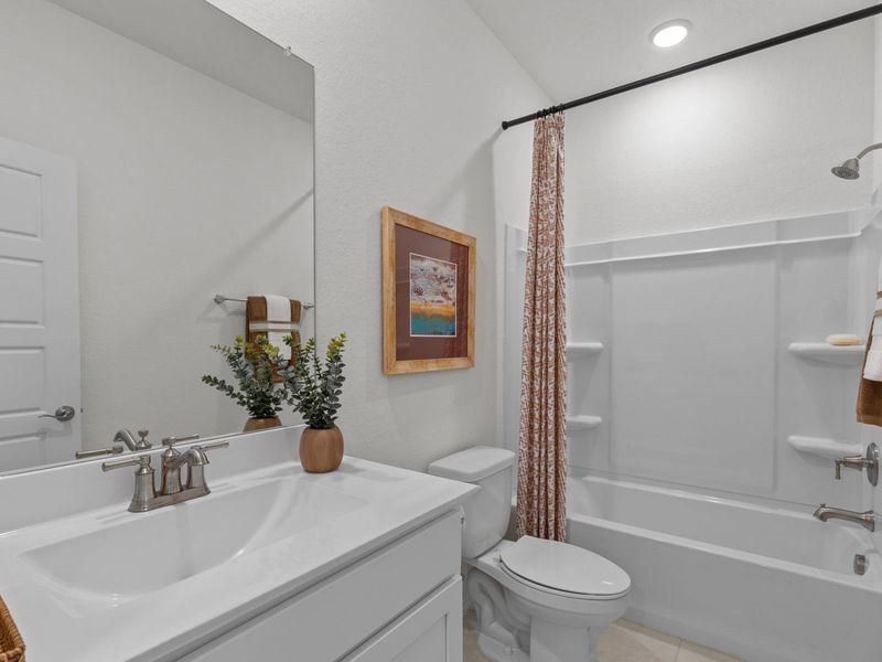 Furnished interior in a model home at Royal Crest in San Antonio (Image 20).