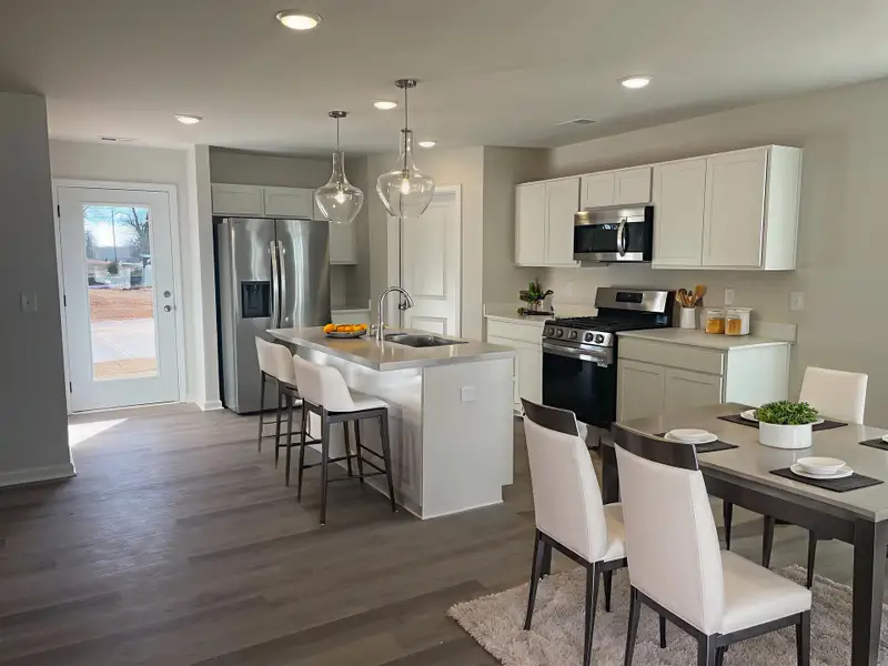 Furnished interior in a model home at Pinehaven in Laurens (Image 5).