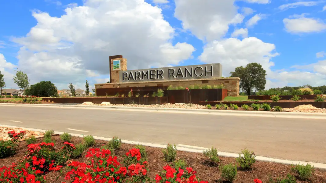 Entrance to the Parmer Ranch community in Georgetown, TX, featuring signage and landscaping (Image 4). Entrance to the Parmer Ranch community in Georgetown, TX, featuring signage and landscaping (Image 4).