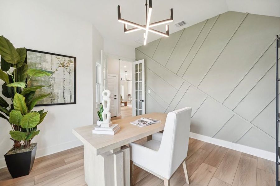 Furnished interior in a model home at Grande Estates in Bertram (Image 14).