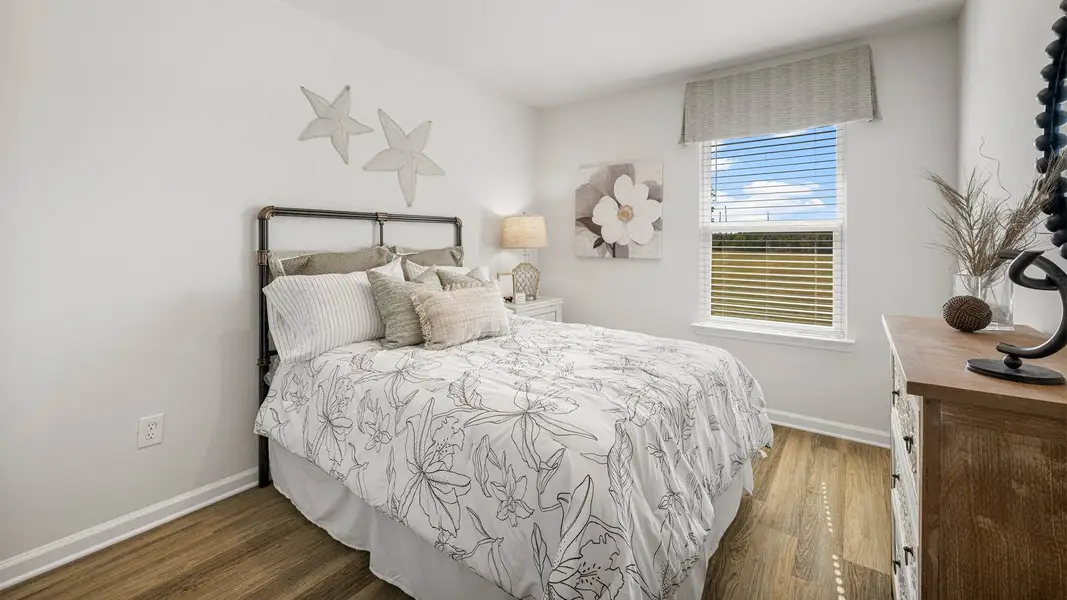 Furnished interior in a model home at Jake's Landing in Lynn Haven (Image 21). Furnished interior in a model home at Jake's Landing in Lynn Haven (Image 21).