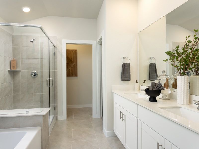 Unwind in your tranquil primary bathroom.