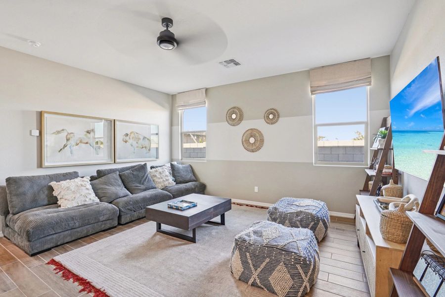 Furnished interior in a model home at Estrella Crossing in Laveen (Image 9).