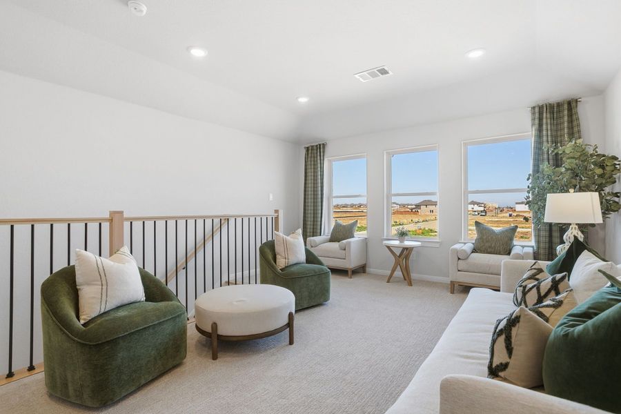 Furnished interior in a model home at Lily Creek at Sutton Fields in Aubrey (Image 40).