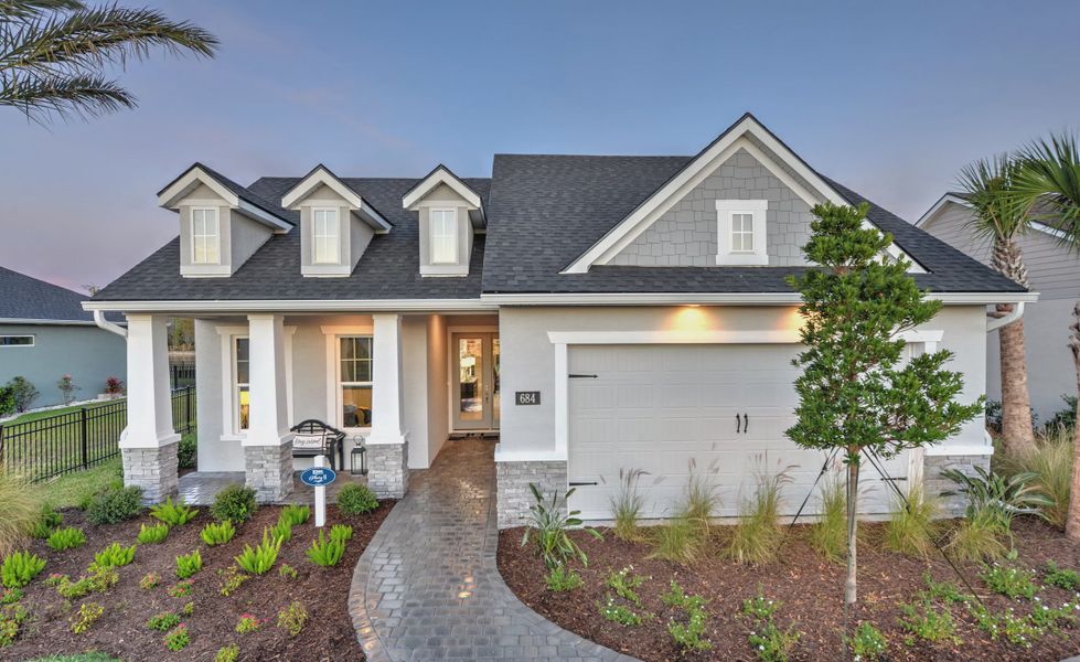 Front exterior of a home in the Mosaic community, located in Daytona Beach, FL (Image 25).