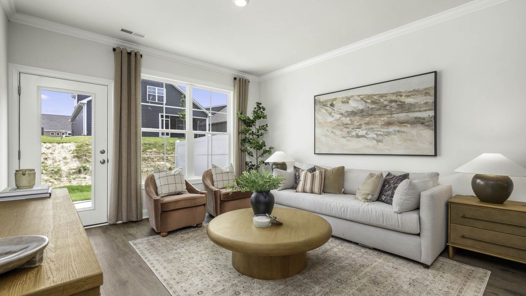 Furnished interior in a model home at The Meadows at Kinsley in Jamestown (Image 18).