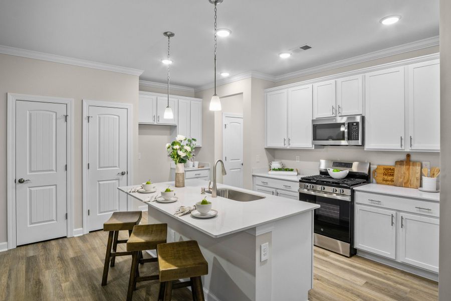 Furnished interior in a model home at The Paired Villas at Bridgewater in Little River (Image 7).