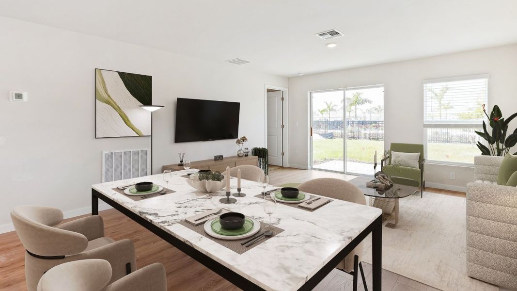 Furnished interior in a model home at Asher Park in Lehigh Acres (Image 49).