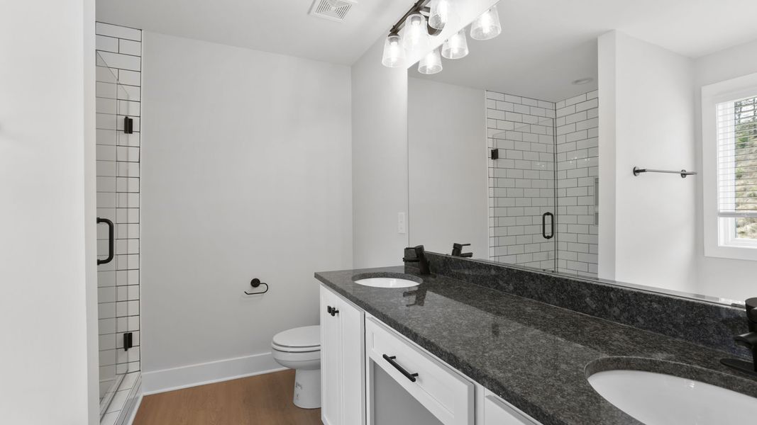 Furnished interior in a model home at Bentley Manor in Greer (Image 11).