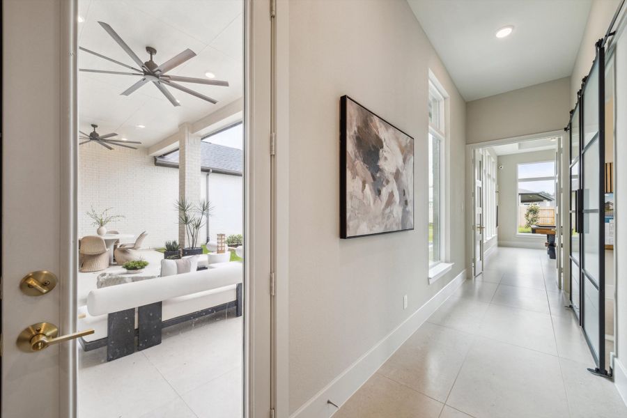 Furnished interior in a model home at ARTAVIA® - 65' Art in Conroe (Image 20).