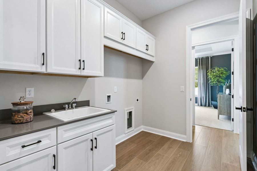 Furnished interior in a model home at Sandy Bluff in Yulee (Image 37).