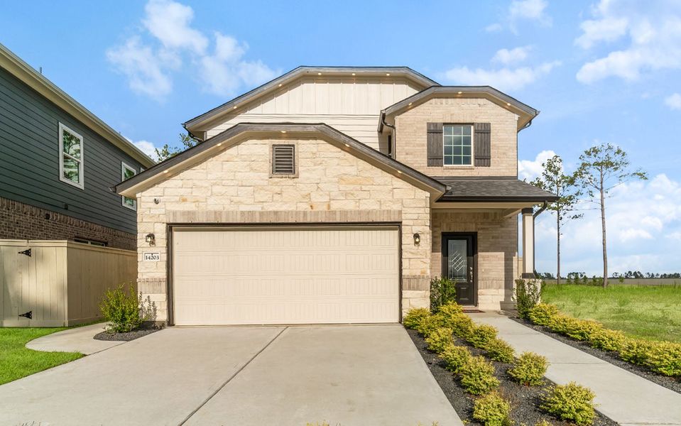 Front exterior of a home in the The Canopies community, located in Splendora, TX (Image 1). Front exterior of a home in the The Canopies community, located in Splendora, TX (Image 1).