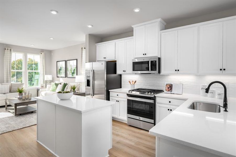 Enjoy a modern kitchen complete with quartz countertops and Stainless-Steel appliances​