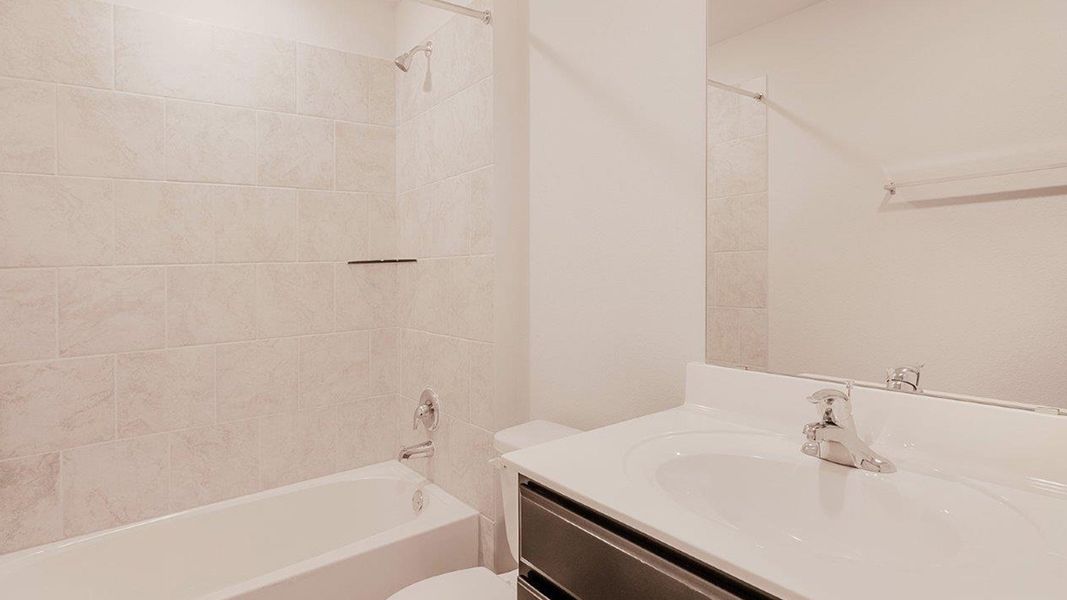 Furnished interior in a model home at The Villages at Schwertner Ranch in Jarrell (Image 26).