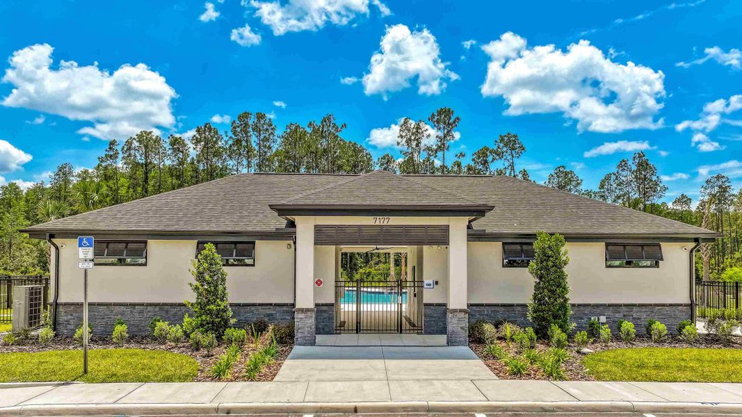 Front exterior of a home in the Deerbrook community, located in Land O' Lakes, FL (Image 6).