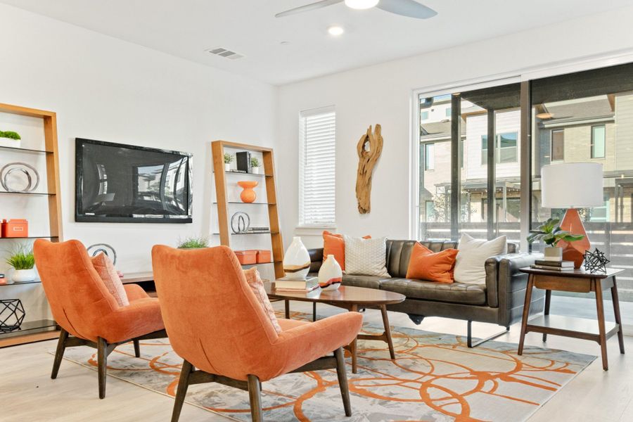 Furnished interior in a model home at Windsong Ranch Townhomes in Prosper (Image 40).