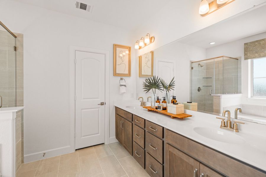 Furnished interior in a model home at Waterbend: Ivy Townhomes in Euless (Image 4).