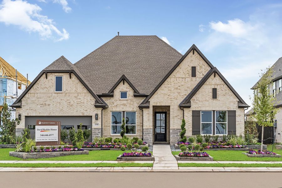 Front exterior of a home in the Harvest Green 65' community, located in Richmond, TX (Image 4). Front exterior of a home in the Harvest Green 65' community, located in Richmond, TX (Image 4).
