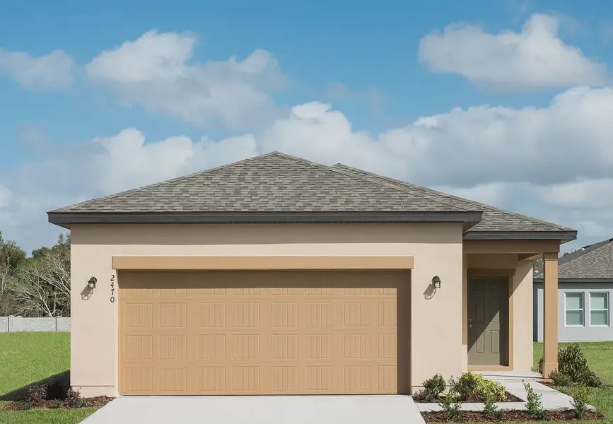 Front exterior of a home in the Landings at Mount Olive community, located in Polk City, FL (Image 10).