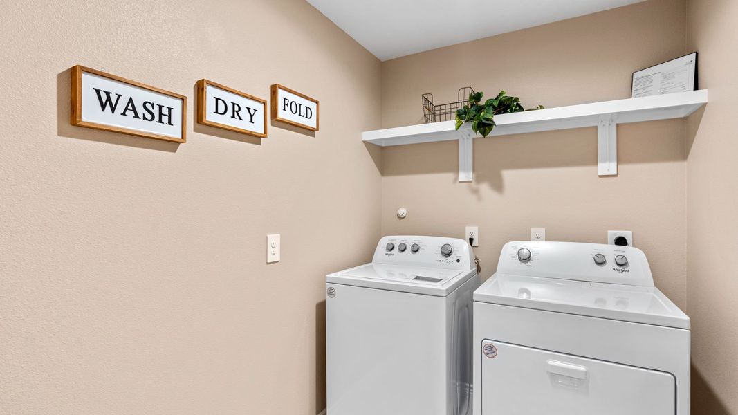 Furnished interior in a model home at The Cottages in Corpus Christi (Image 26).