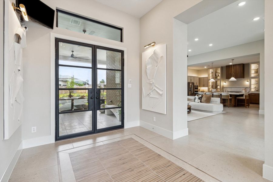 Furnished interior in a model home at ARTAVIA® - 65' Art in Conroe (Image 9).