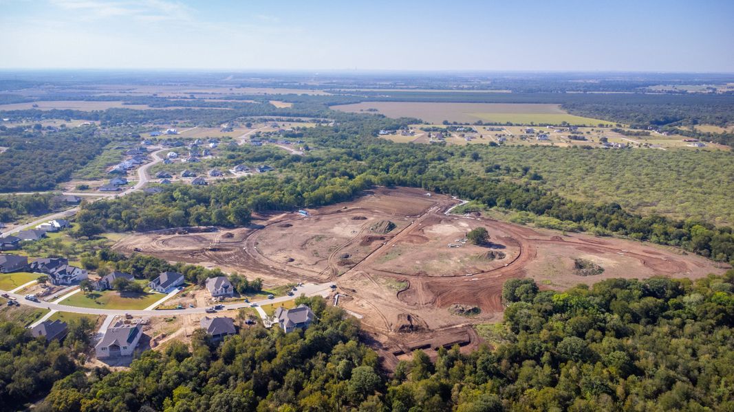Site preparation and early development at Riverbend at Double Eagle - Boulevard Collection in Cedar Creek, TX (Image 27).