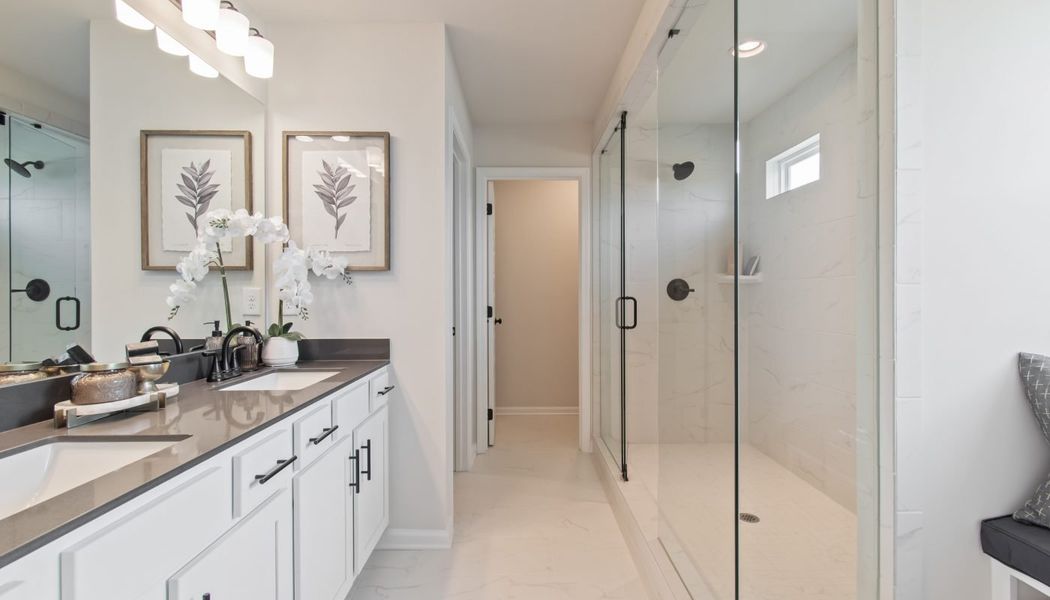 Furnished interior in a model home at Kentmere in Auburn (Image 49).