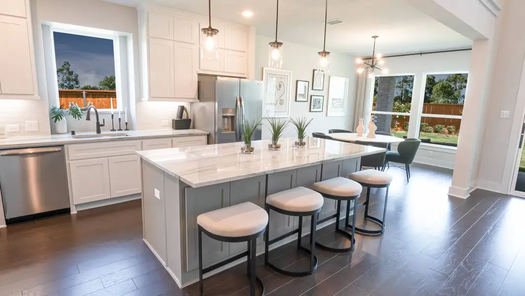 Furnished interior in a model home at Valencia on The Lake in Little Elm (Image 4). Furnished interior in a model home at Valencia on The Lake in Little Elm (Image 4).