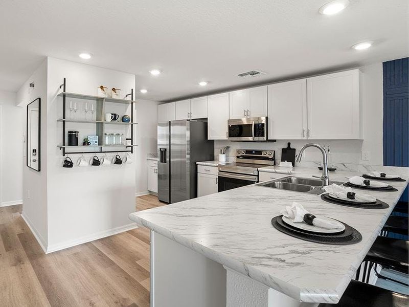 Your open kitchen includes beautiful features and finishes - Catalina townhome model in Winter Haven, FL Your open kitchen includes beautiful features and finishes - Catalina townhome model in Winter Haven, FL