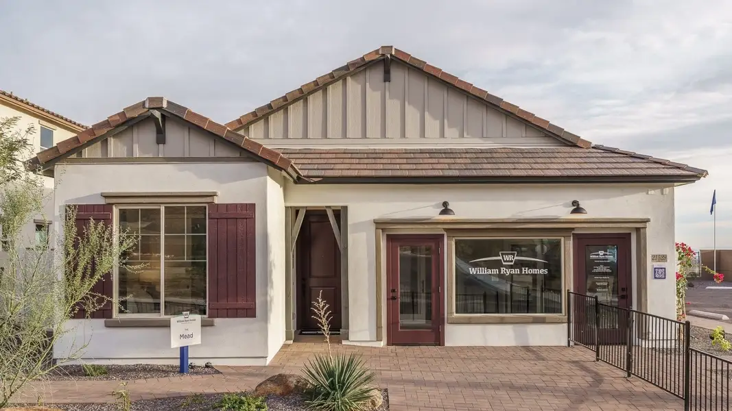 Front exterior of a home in the The Ridge at Sienna Hills community, located in Buckeye, AZ (Image 2).
