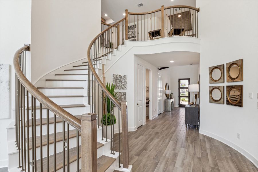Furnished interior in a model home at The Woodlands Hills – 55' in Willis (Image 6).