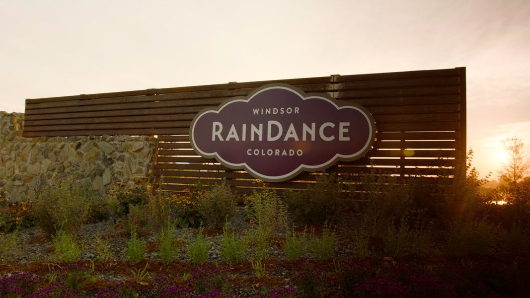 Entrance to the RainDance community in Windsor, CO, featuring signage and landscaping (Image 2).