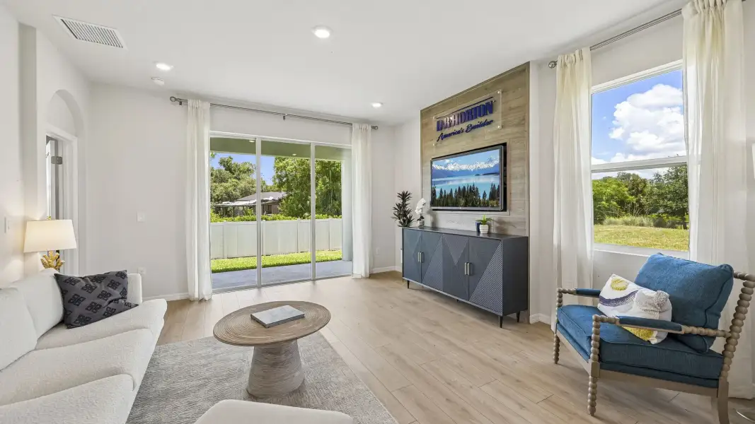 Furnished interior in a model home at Gladstone Park Villas in Sarasota (Image 13).