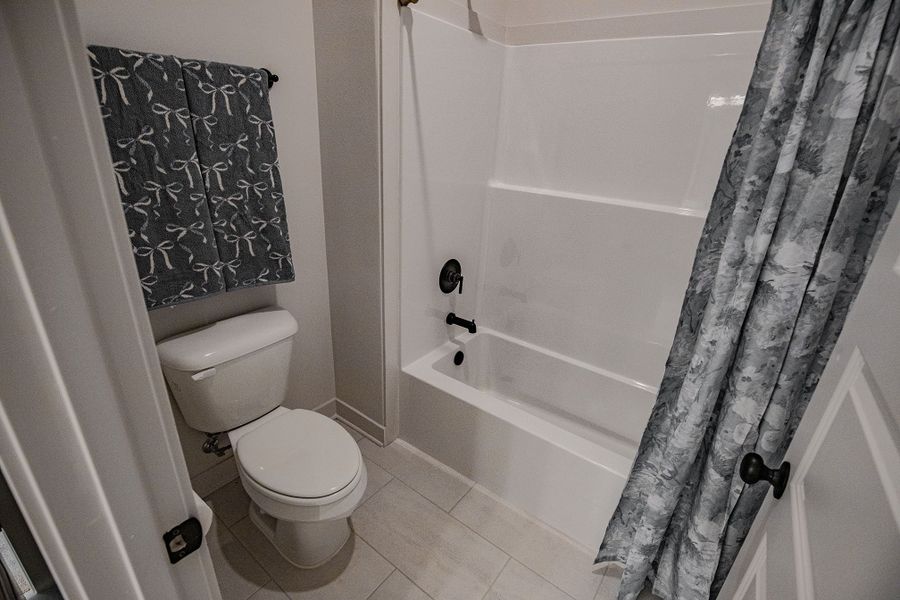 Furnished interior in a model home at Amherst in Cordova (Image 24).