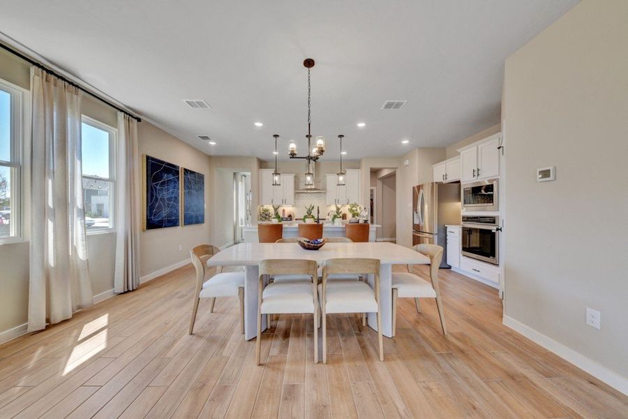 Furnished interior in a model home at Veranda Designer in San Antonio (Image 9).