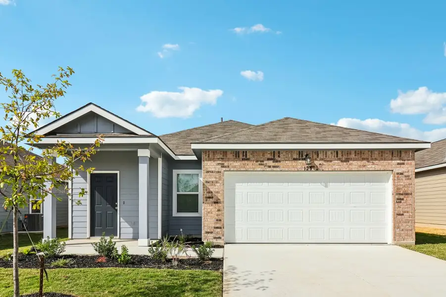 Front exterior of a home in the Willow Springs community, located in Buda, TX (Image 2). Front exterior of a home in the Willow Springs community, located in Buda, TX (Image 2).