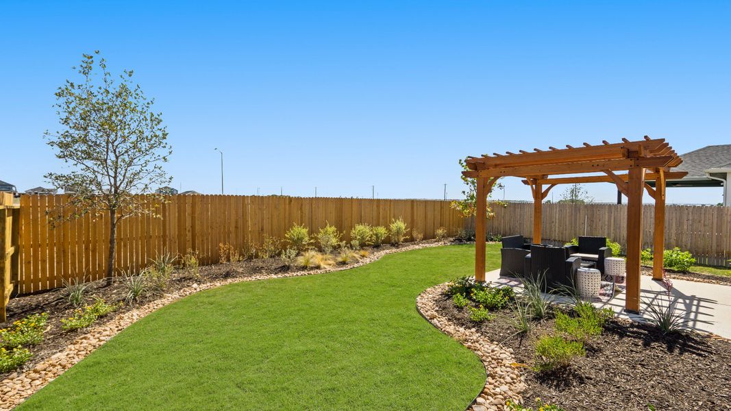 Swenson Heights model home backyard and patio image