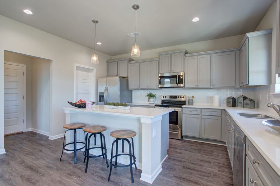 Furnished interior in a model home at Legends at Old Monroe in Monroe (Image 18).