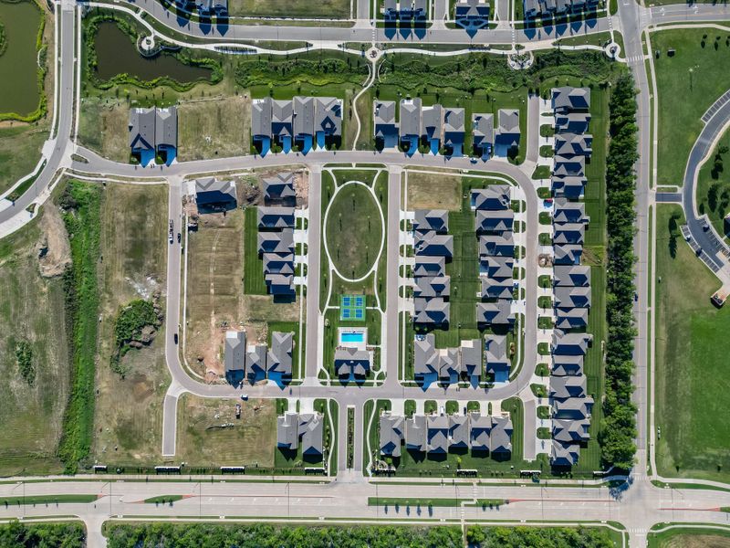 Aerial view of the The Courtyards at The Heritage community in Andover, KS, showing layout and nearby surroundings (Image 16). Aerial view of the The Courtyards at The Heritage community in Andover, KS, showing layout and nearby surroundings (Image 16).