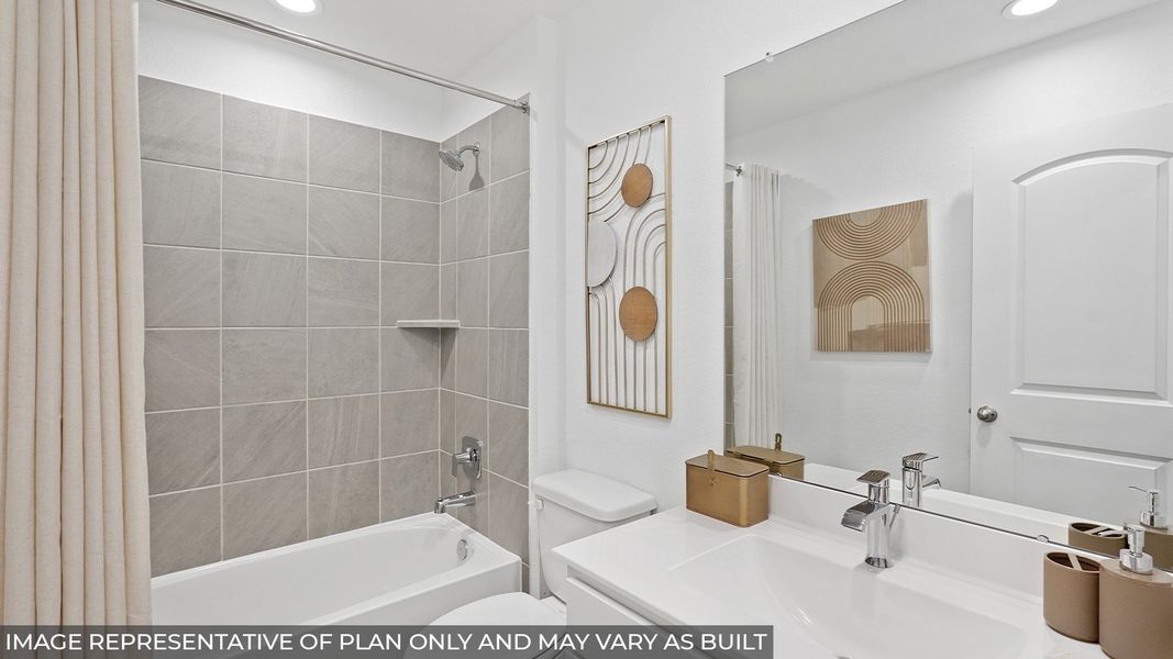 Furnished interior in a model home at East Williams Cove in Conroe (Image 14). Furnished interior in a model home at East Williams Cove in Conroe (Image 14).