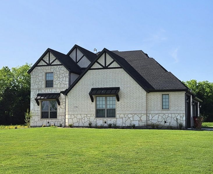Front exterior of a home in the Sundance, Campbell community, located in Campbell, TX (Image 1). Front exterior of a home in the Sundance, Campbell community, located in Campbell, TX (Image 1).