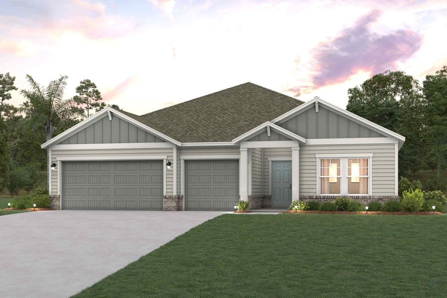 A house with a garage and a lawn in front of it. A house with a garage and a lawn in front of it.