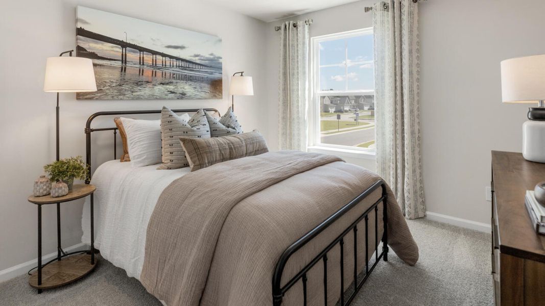 Furnished interior in a model home at Grayson Park Townhomes in Leland (Image 38).