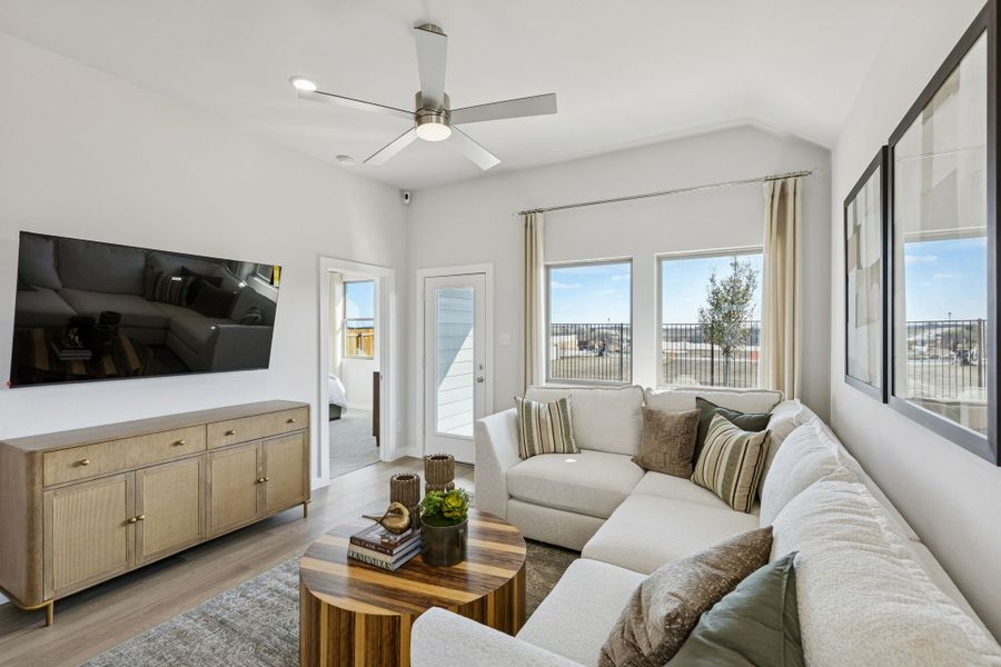 Living Room in a Nicholson Ranch Cedar Model Home in Lavon TX by Trophy Signature Homes