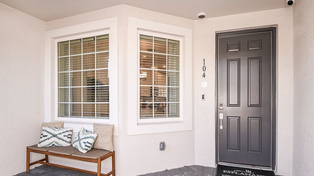 Furnished interior in a model home at Esplanade Lake Club Condos in Fort Myers (Image 38).