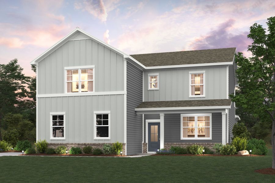 A house with a lawn in front of it.