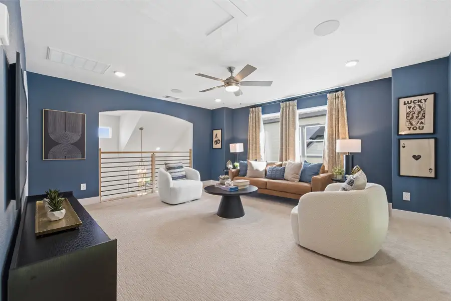 Furnished interior in a model home at Wildrye in Waller (Image 52).