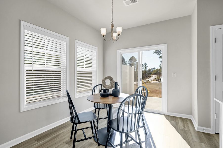 Furnished interior in a model home at Percival Village in Columbia (Image 10).