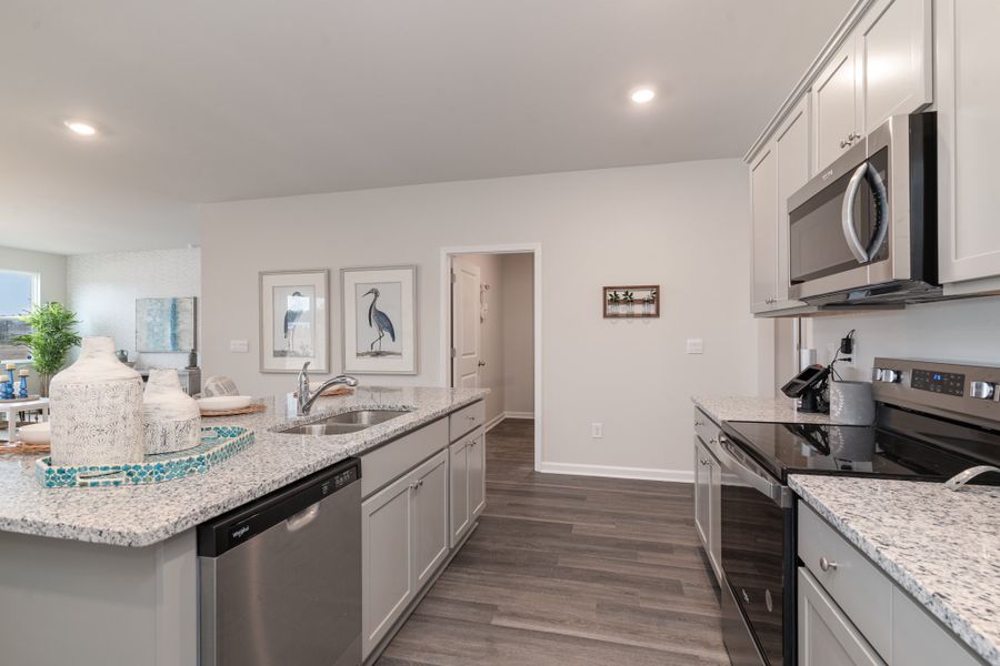 Furnished interior in a model home at Kingston Bay in Conway (Image 19).